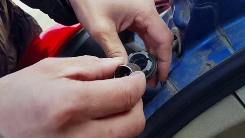 A man pulls out a cartridge for a stop lamp lamp Video stock 80528170