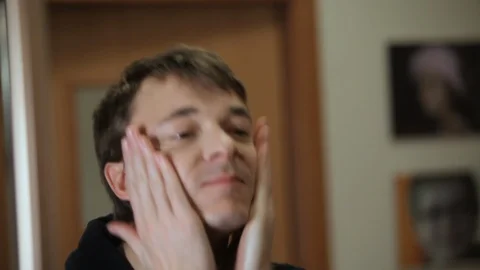 Man pulls out grey-haired hair Stock Footage 99802403