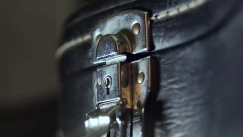 The man pulls out a guitar out of the case Stock Footage 71691248