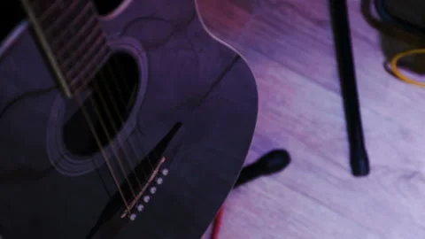 The man pulls out a guitar out of the case Stock Footage 87670118