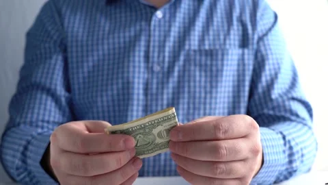 Man Pulls Out of His Pocket and Shows One Dollar Stock Footage 167887049