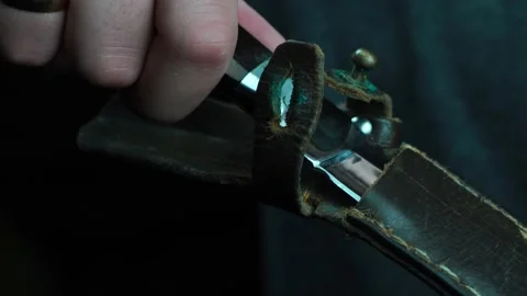 Man pulls out knife from the holster close up Stock Footage 130220702