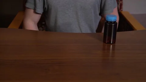 The man pulls out medication for a patient. Stock Footage 130199543