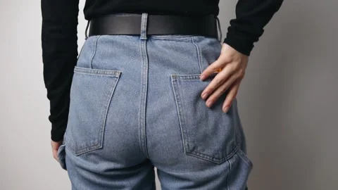 Man pulls out a utility knife from the back pocket Stock Footage 142778402