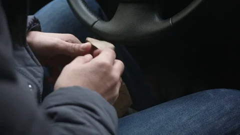 Man pulls from the package large sum of money Stock Footage 73810966