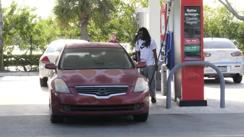 Man Pumps Gas Stock Footage 200853902