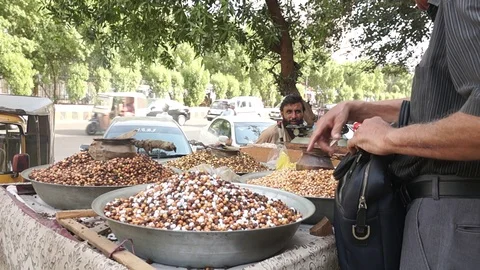 Man Purchasing Dry fruit 스톡 동영상 99363243