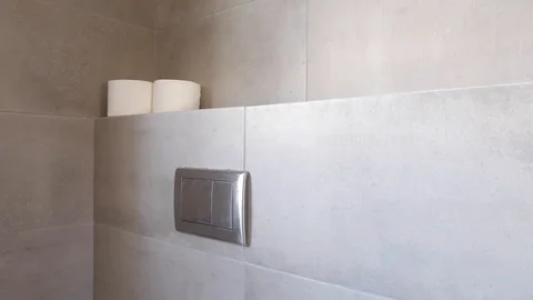 Man push flush button in modern restroom Video stock 112360037