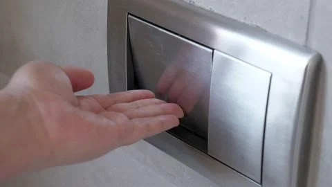 Man push flush button in modern toilet, closeup Video stock 145498523
