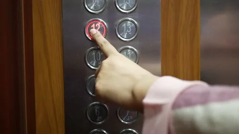The man push lift button down. Stock Footage 162667923