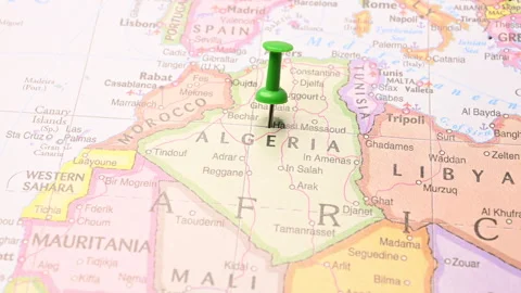 Man Push Pin Pointing On Algeria On World Travel Map Stock Footage 328101445