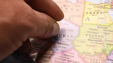 Man Push Pin Pointing On Chad On World Travel Map Stock Footage 328104240