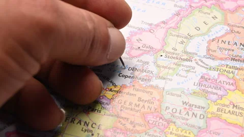 Man Push Pin Pointing On  Denmark On World Travel Map Stock Footage 328071955