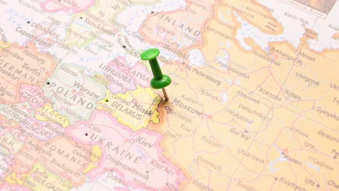 Man Push Pin Pointing On  Moscow On World Travel Map Stock Footage 328134968