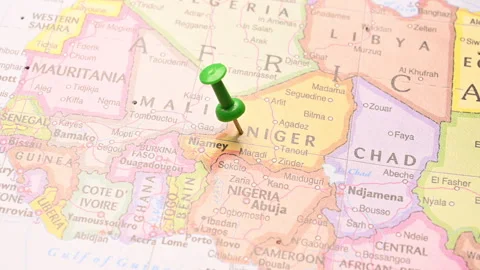 Man Push Pin Pointing On Niger On World Travel Map Stock Footage 328107876