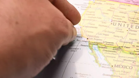 Man Push Pin Pointing On  San Diego On World Travel Map Stock-Footage 328076364