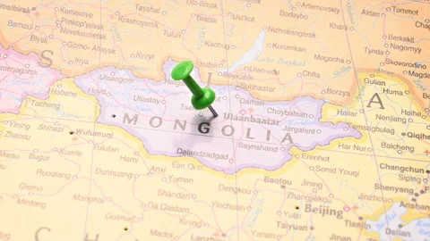 Man Push Pin Pointing On Ulaanbaatar  On World Travel Map Stock Footage 328142799