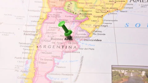 Man Push Pin Pointing On Uruguay On World Travel Map Stock Footage 328135920