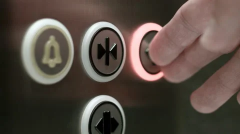 Man pushes a button opening elevator doors. Close up Video stock 51458249