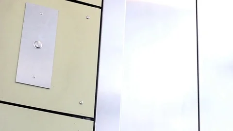 Man pushes the elevator button in modern office building Video stock 78861875