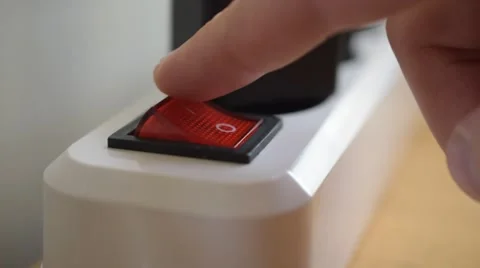 A man pushes power button Stock Footage 67177477