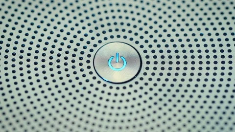 A man pushes power button to turn computer monitor on and off Stock Footage 70370435