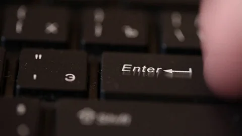 Man pushes a white button enter. Macro shooting Video stock 72560613