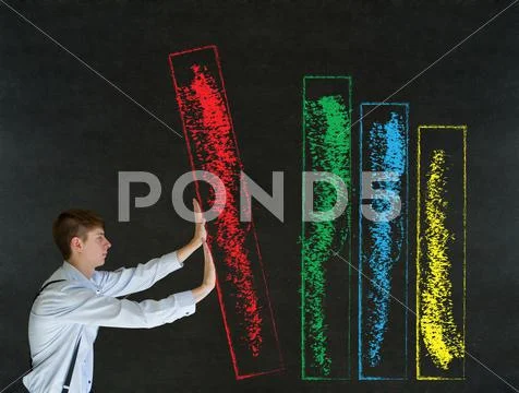 Man pushing blackboard sales graph or chart Stock Photos