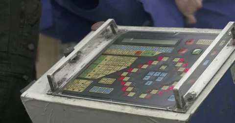 Man pushing button in factory Stock Footage 88562481
