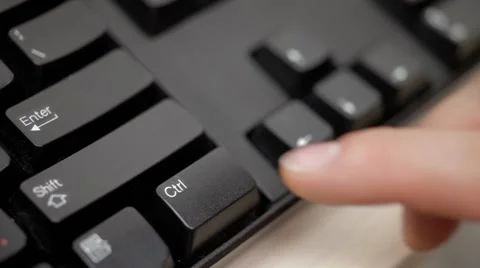 A man is pushing Ctrl key on the keyboard Stock Footage 54354473
