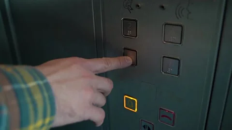 Man pushing elevator button Stock Footage 160742804