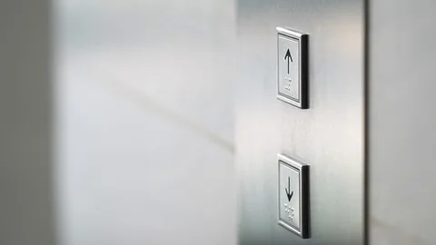 Man Pushing Elevator Button in Modern Building. Male Finger Pressing Lift Button Stock Footage 122215443