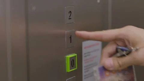 Man Pushing Elevator Button In Modern Building. Male Finger Pressing Lift Button Stock Footage 214408383