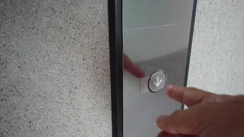 Man pushing elevator down button. Stock Footage 152616807