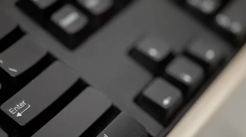 A man is pushing Enter button on keyboard Stock Footage 54354637