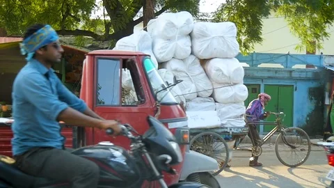 Man Pushing Heavy Load in India Stock Footage 91488237