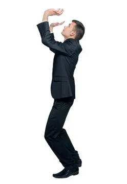 Man pushing up Stock-Fotos