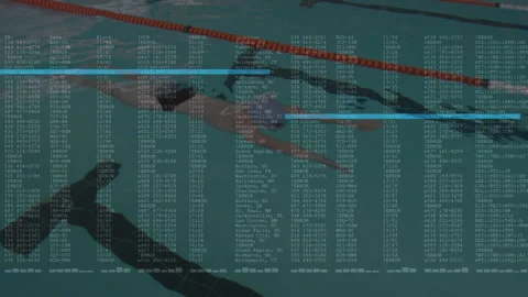 Man pushing off wall gliding underwater along red lane rope analyzing tech data Stock Footage 316352456