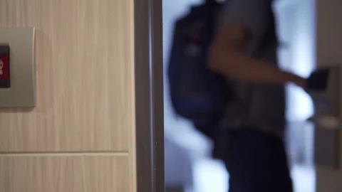 Man put the card and Open the door of the hotel room. Credit Card for Travel. 4K Stock Footage 93896804