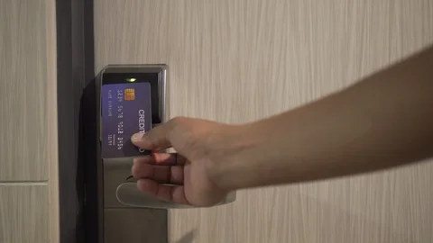 Man put the card and Open the door of the hotel room. Credit Card for Travel. 4K Video stock 93897065