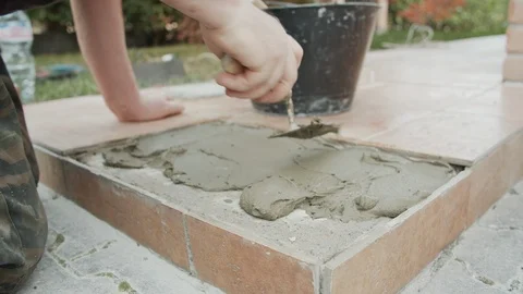 A Man Put The Cement On The Floor Stock Footage 116740192