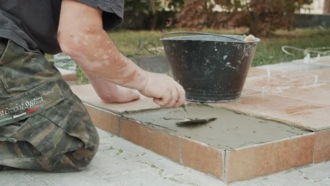 A Man Put The Cement On The Floor Stock Footage 116740663