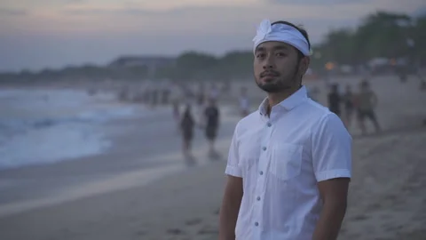 Man Put On Face Mask on Beach Coronavirus COVID-19 Bali Indonesia Stock Footage 156682943