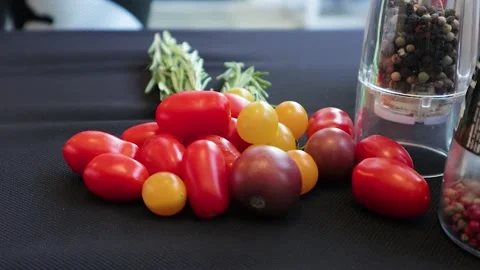 Man put garlic next to tomatoes and spices Stock Footage 200204067