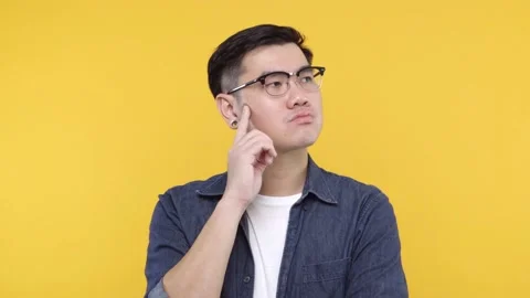 A man put on glasses and denim jacket white t-shirt talking and gesturing on cam Stock Footage 144669409