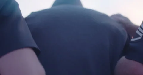 Man Is Put In Hand Cuffs, Arrest By Two Police Officers, Cops, Under Arrest Stock Footage 165952449