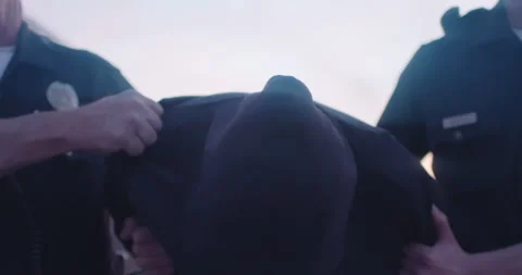Man Is Put In Hand Cuffs, Arrest By Two Police Officers, Cops, Under Arrest Stock Footage 166403802