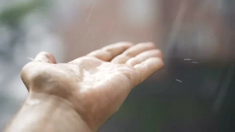 The man put his hands on the rain Stock Footage 109529726