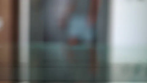 Man put the keys on glass Table at Home. Close-Up depth of field background Stock Footage 214298877