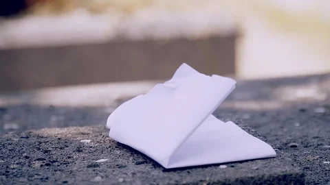 Man put letter on tombstone Stock Footage 77649045